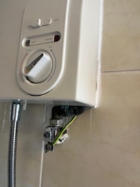 Exposed electrical wires in the shower