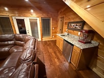 Lower level theatre room and mini kitchen