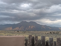 Evening sun reflecting off the mountains taken from the backyard.