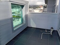 The wires and clearly a nice well designed balcony so - why is this an expensive hotel room?