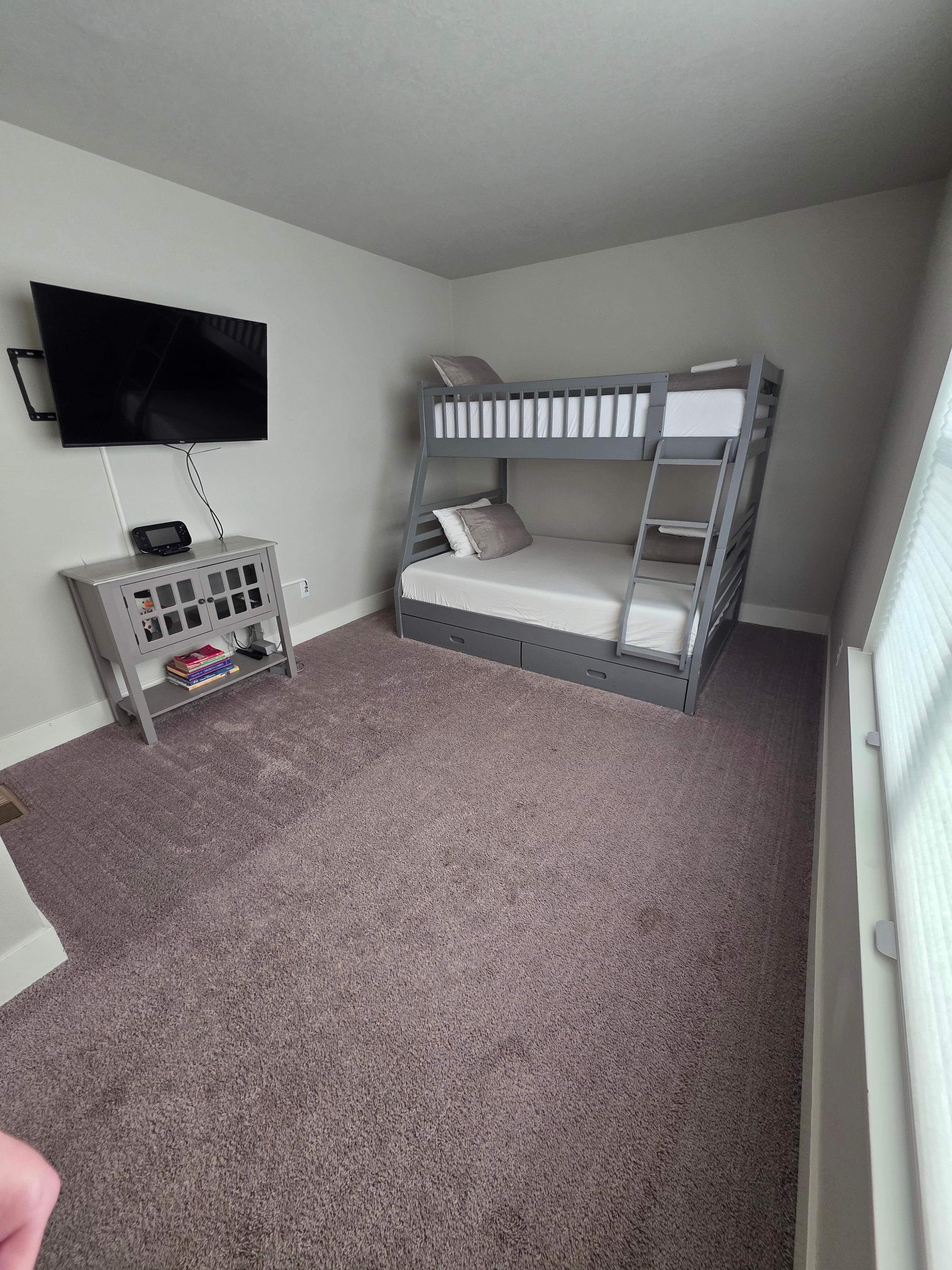 Fun bedroom with gaming system