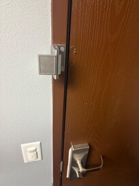 Door hinge lock was mounted the wrong way.