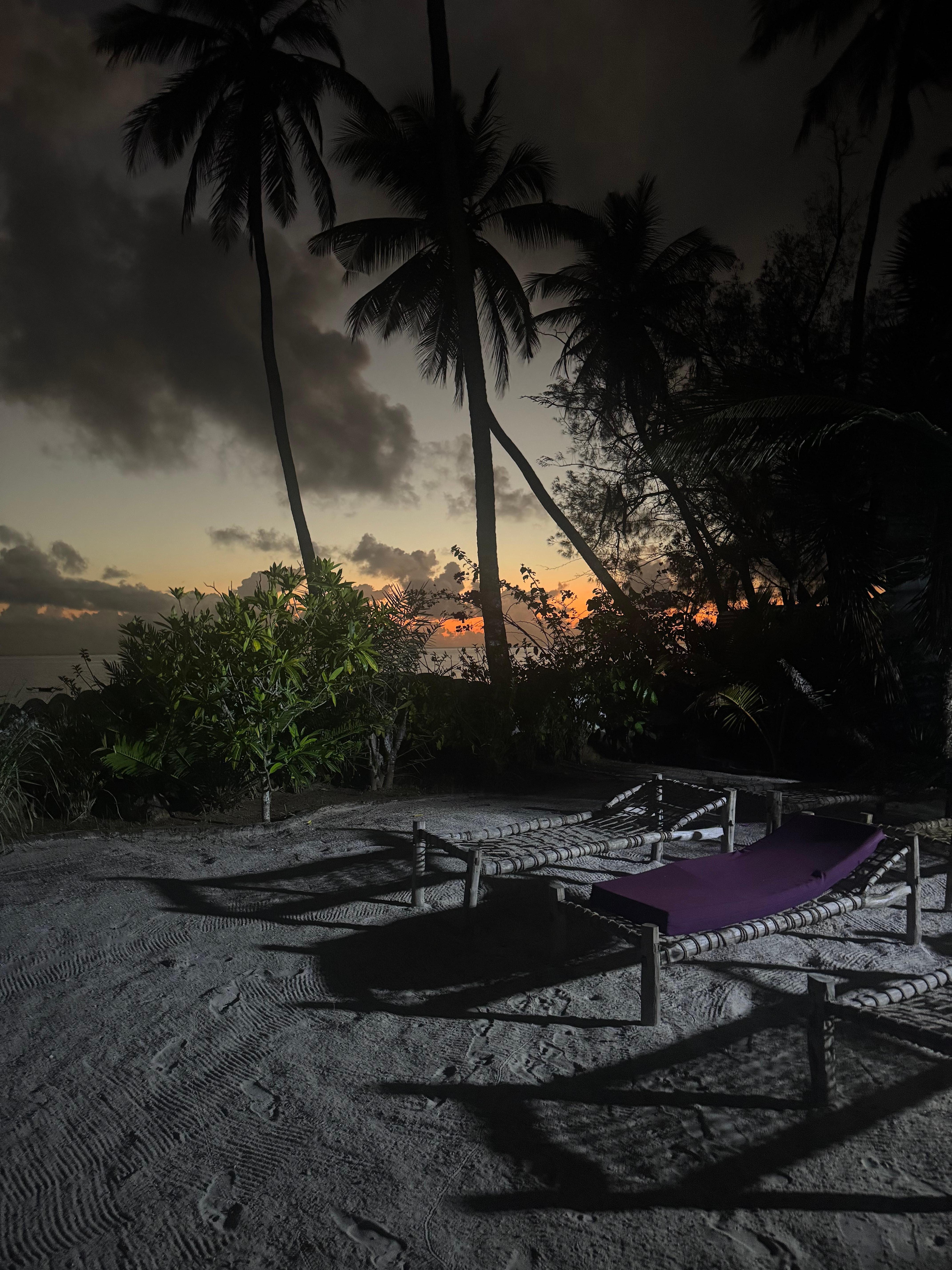 Sunrise and the lounge chairs for an afternoon rest. Every morning, the sand was raked out like a Zen garden!