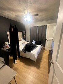 very dark small bedroom