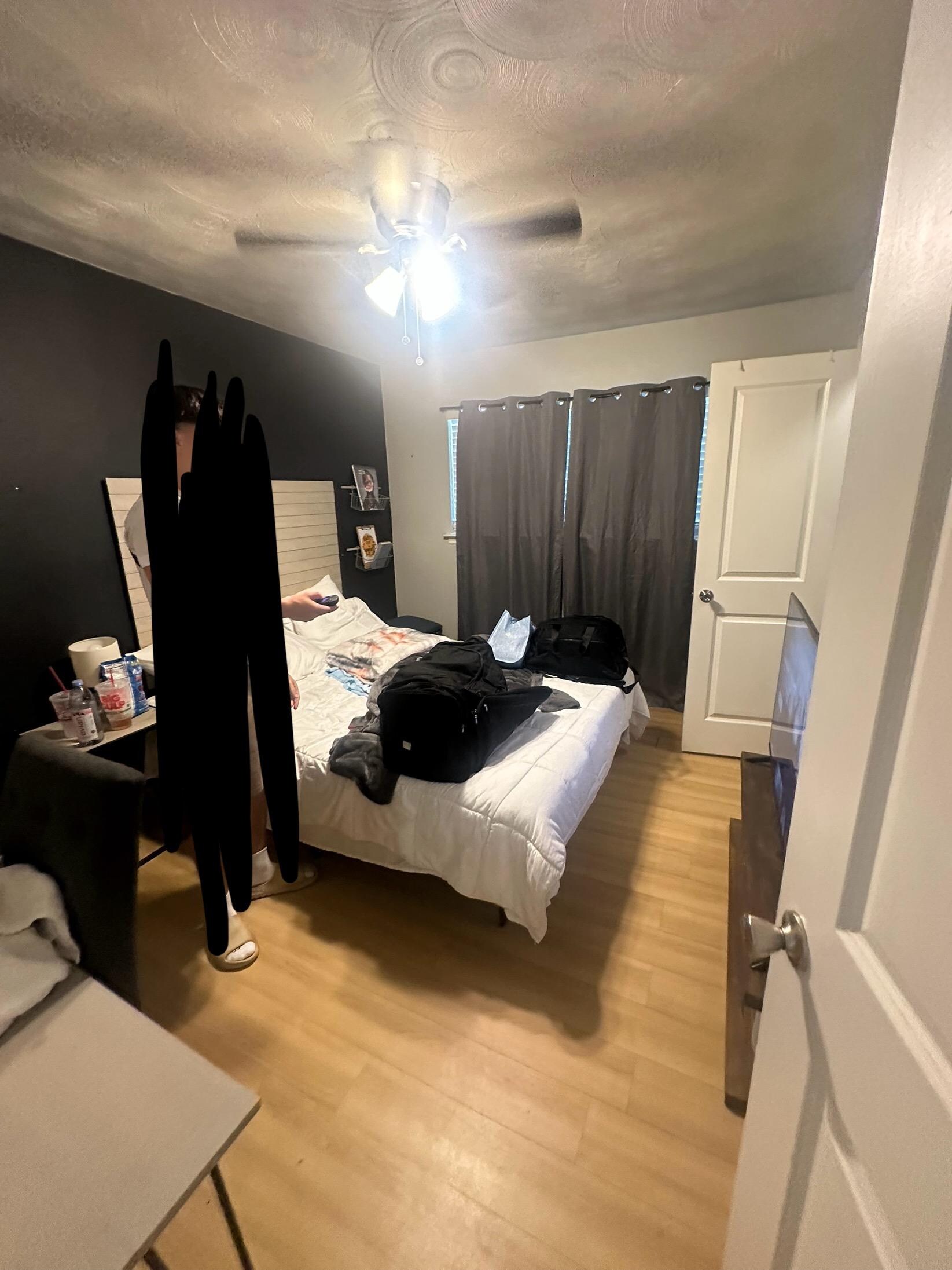 very dark small bedroom 