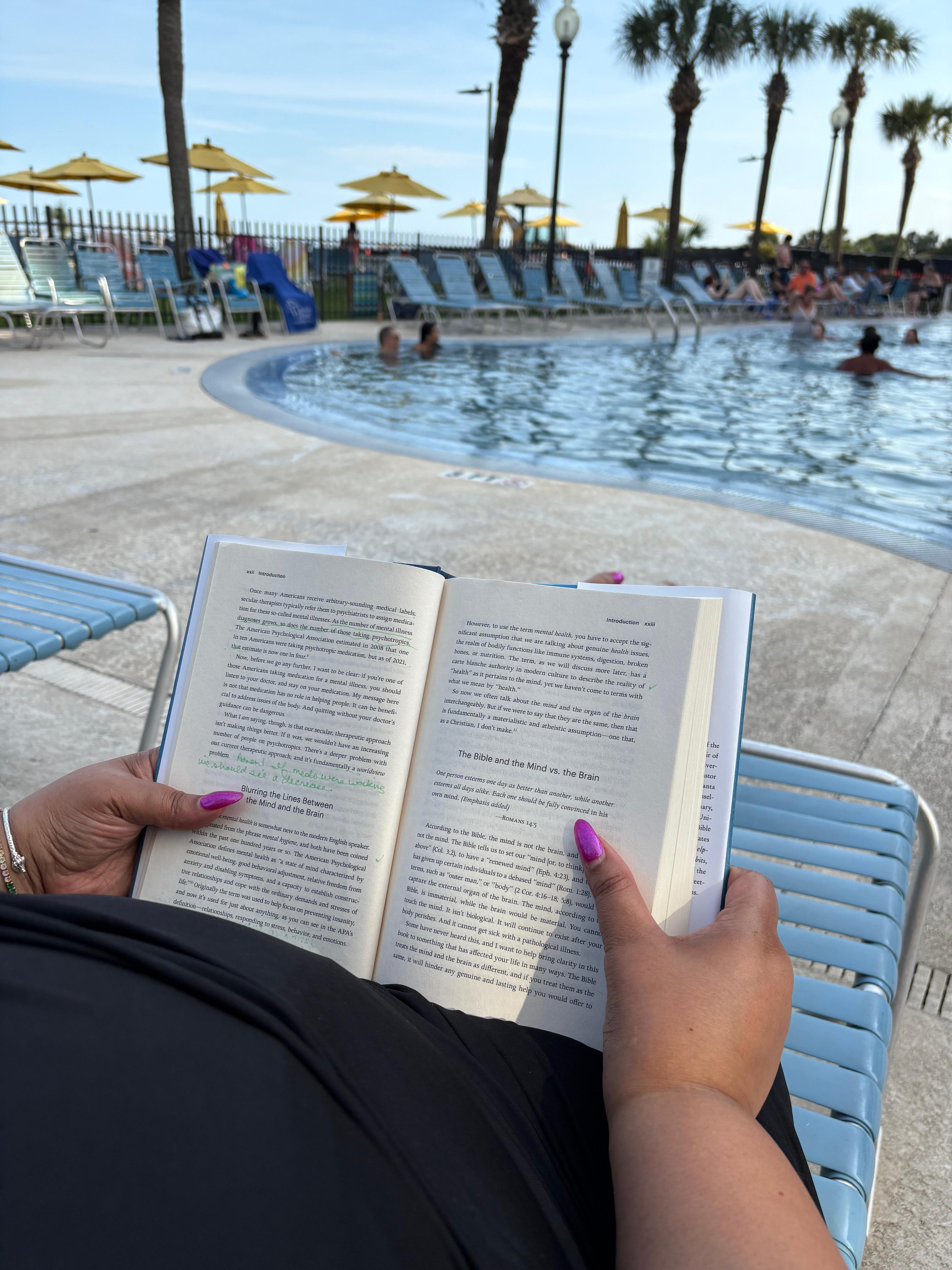 poolside reading a book
