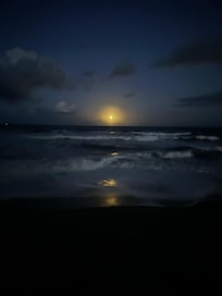 Beautiful full moon over the ocean