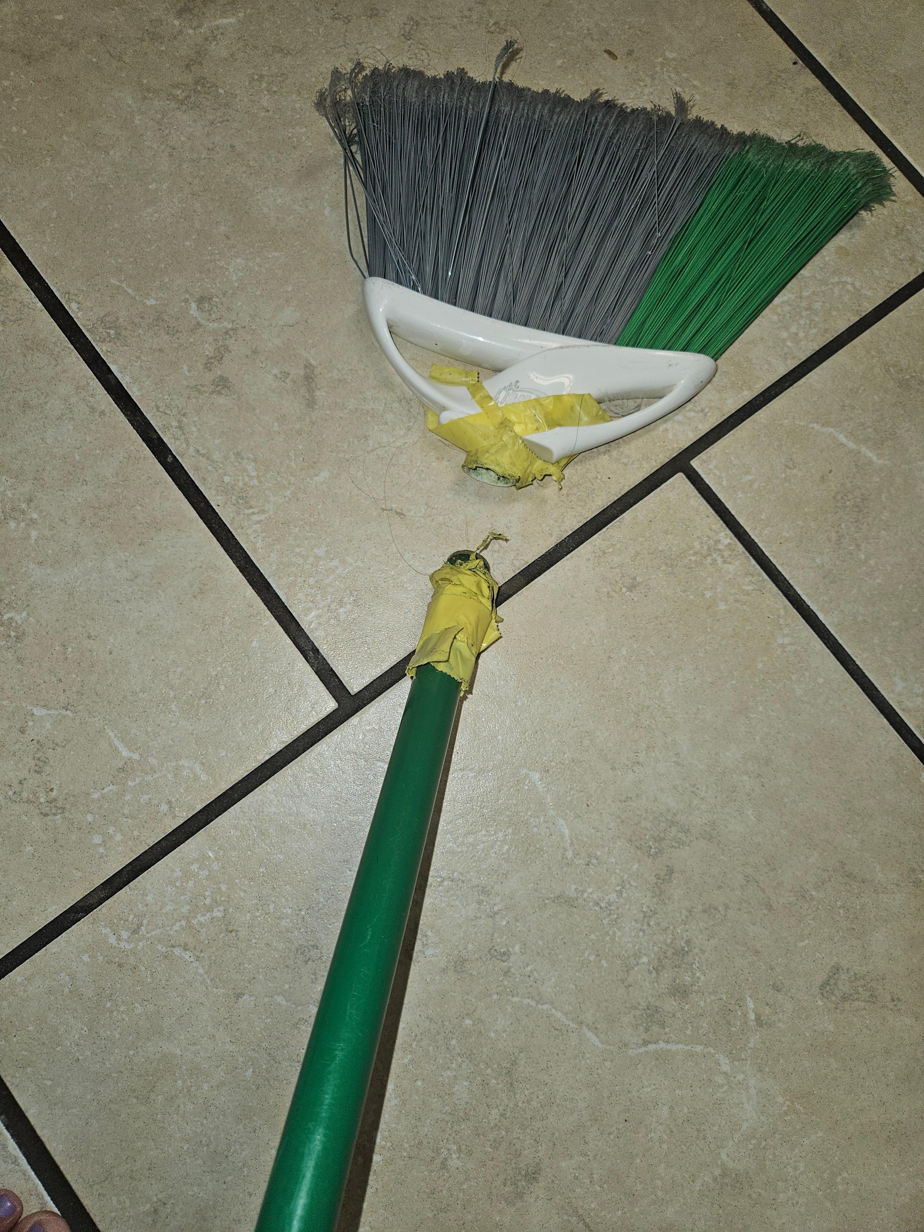 They taped the broom together and not well.