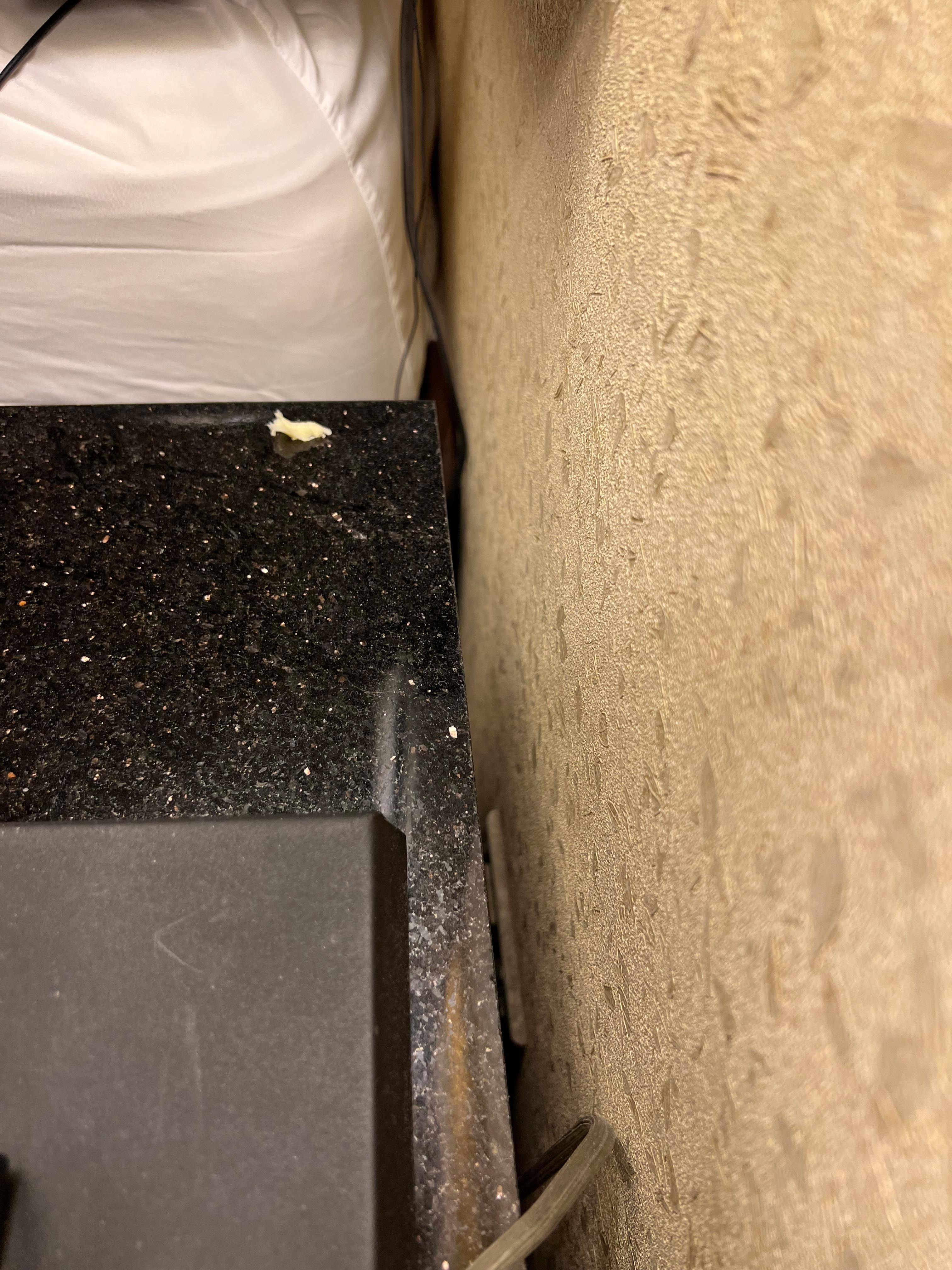 Food crumbs on nightstand 