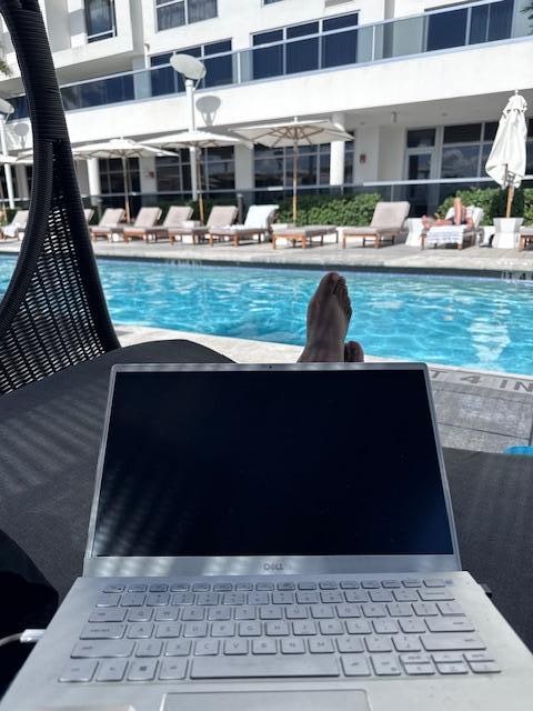 Working by the pool. 