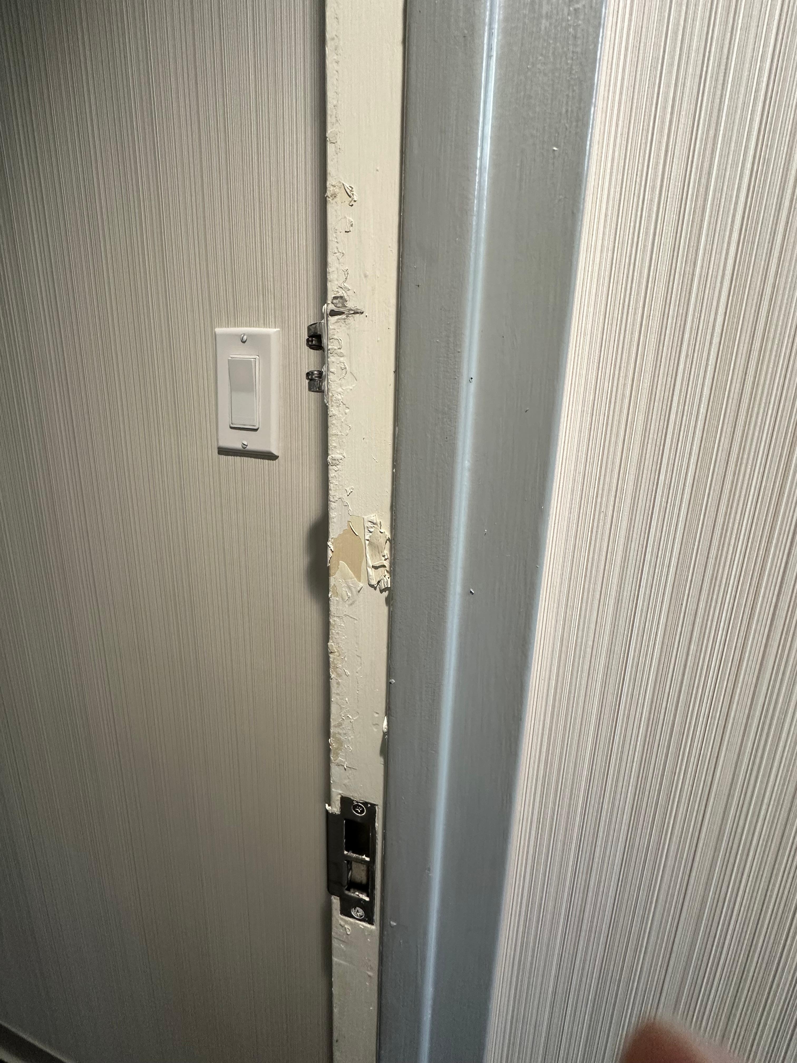 The door frame had layers of paint that were peeling each time the door was used.