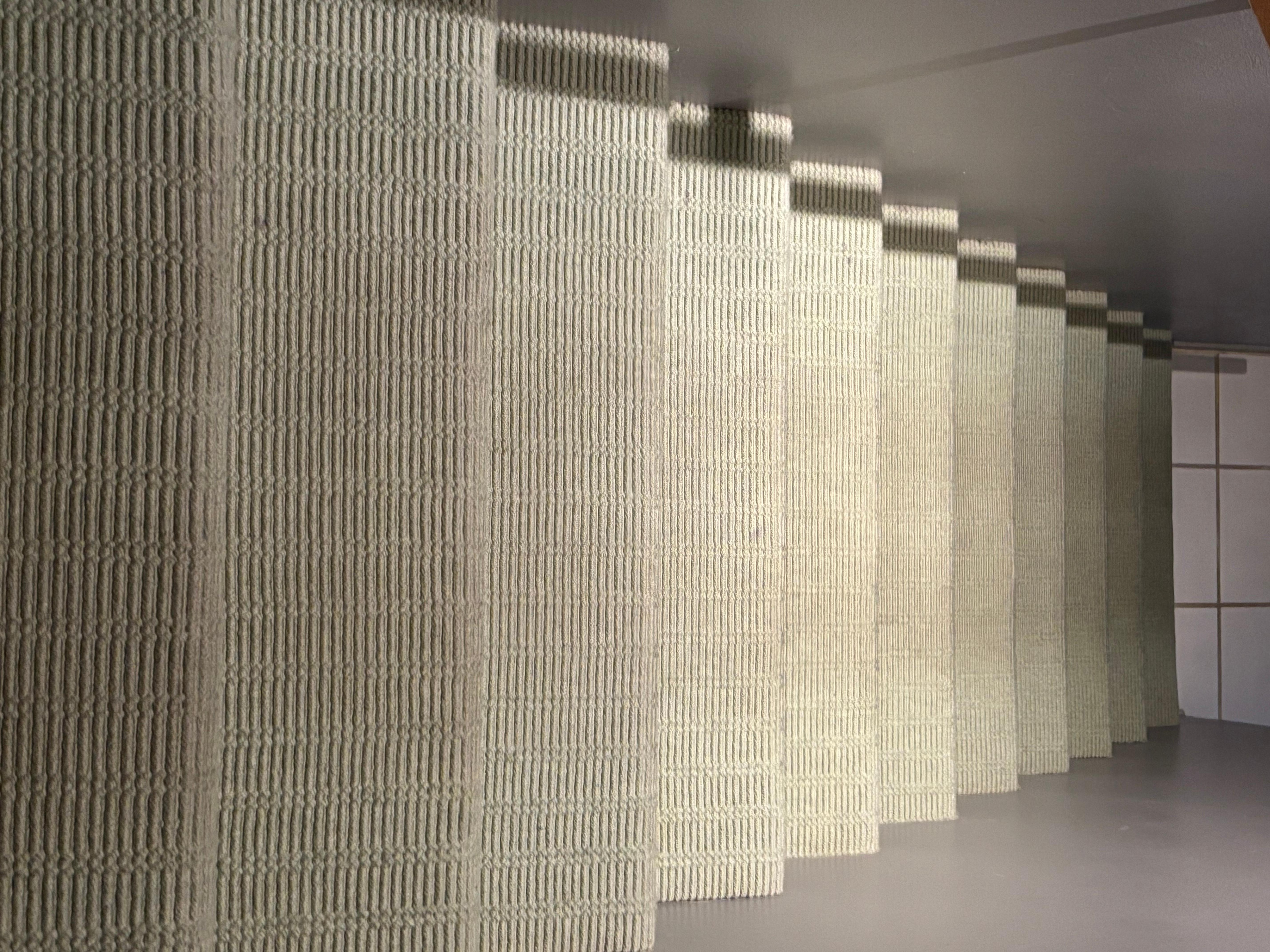 Stained carpet , worn and dirty