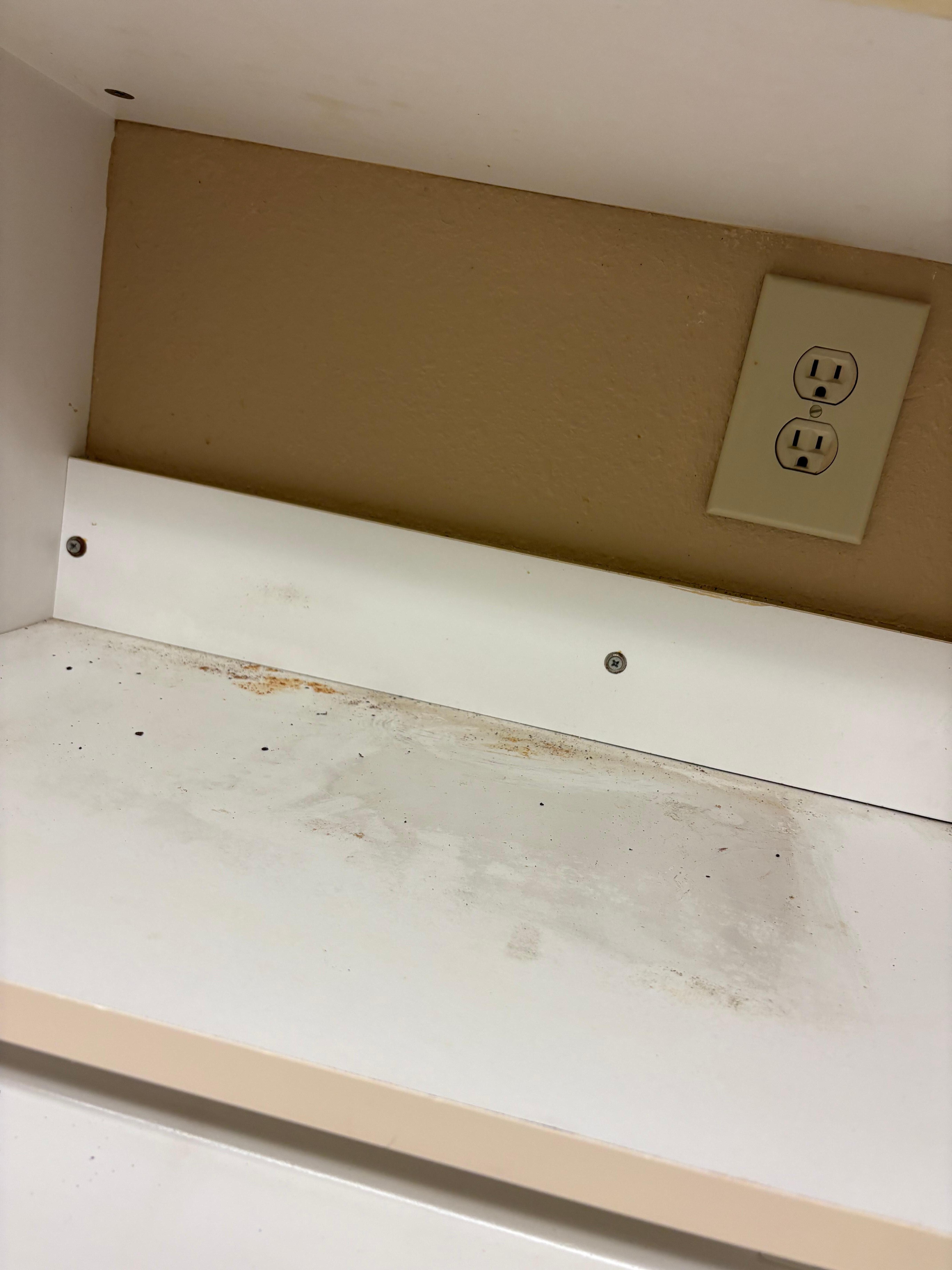 Under the microwave (I took it out to scrub everything)