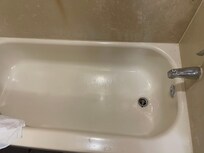 Rusting and peeling bathtub.