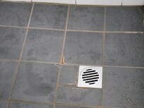 Broken floor tiles in shower