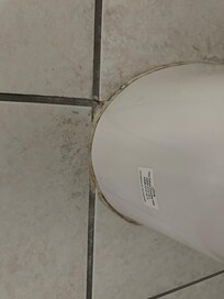 Mold/dirt around bathroom toilet
