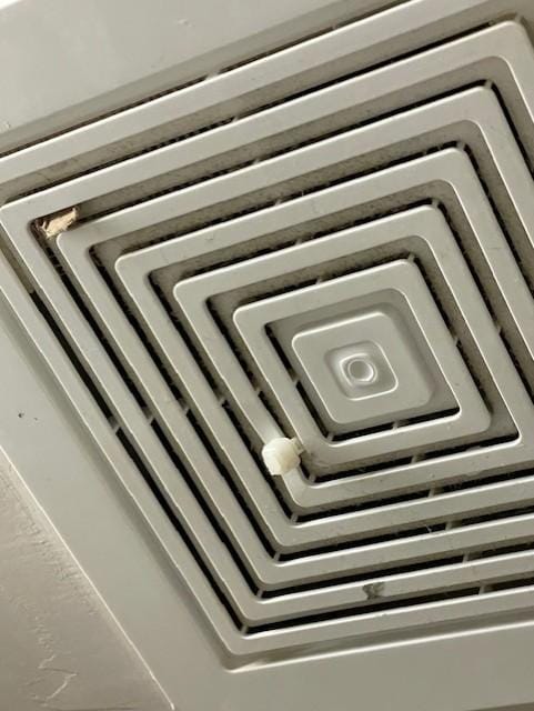 Bathroom ceiling fan was filthy and stuff falling from it.