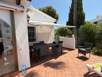 Outside seating area under the awning