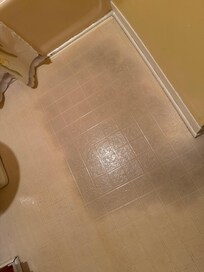 Worn and discolored flooring