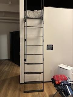 Eight rung vertical metal ladder is dangerous to use.