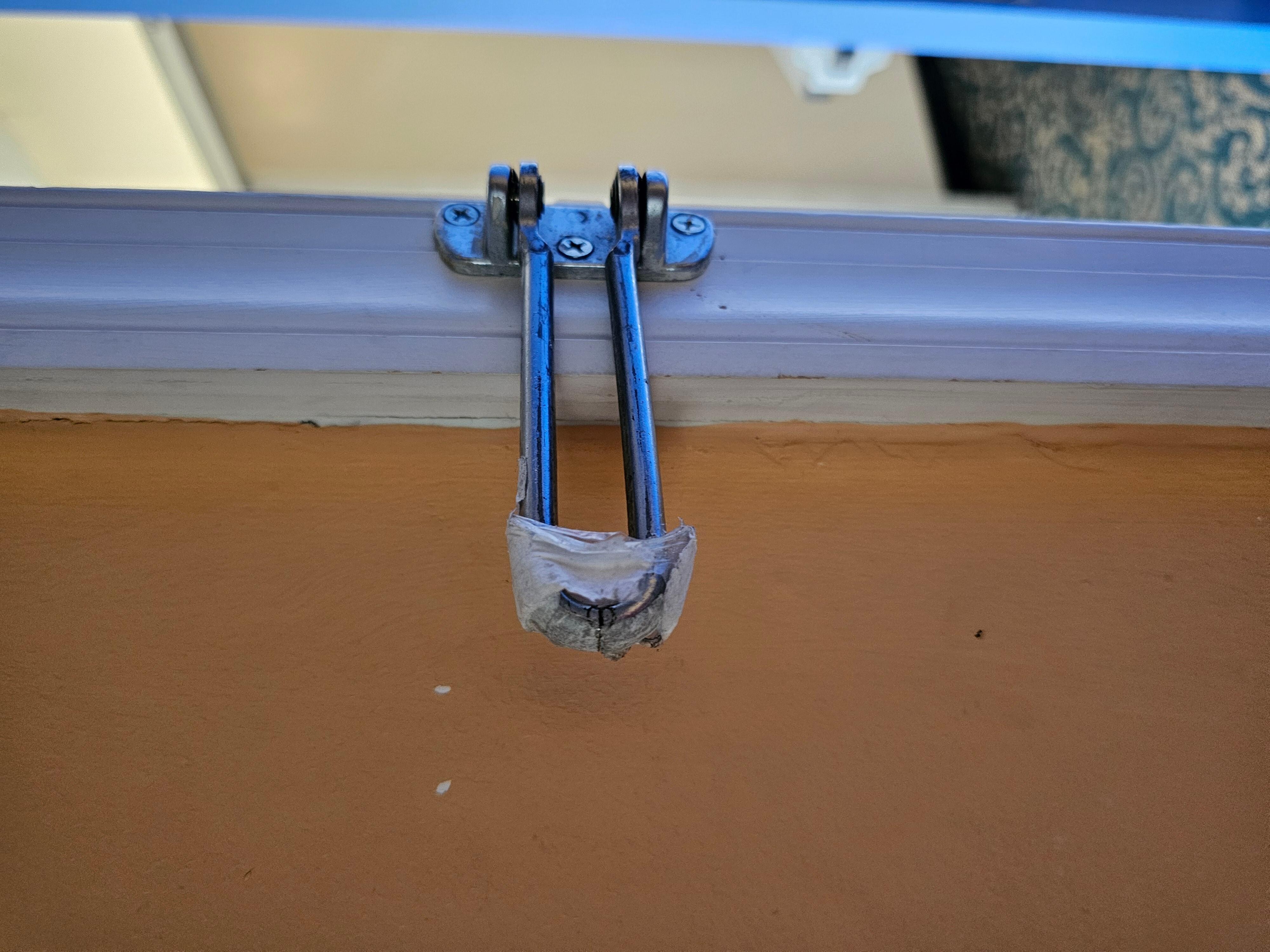 The security door latch was broken.