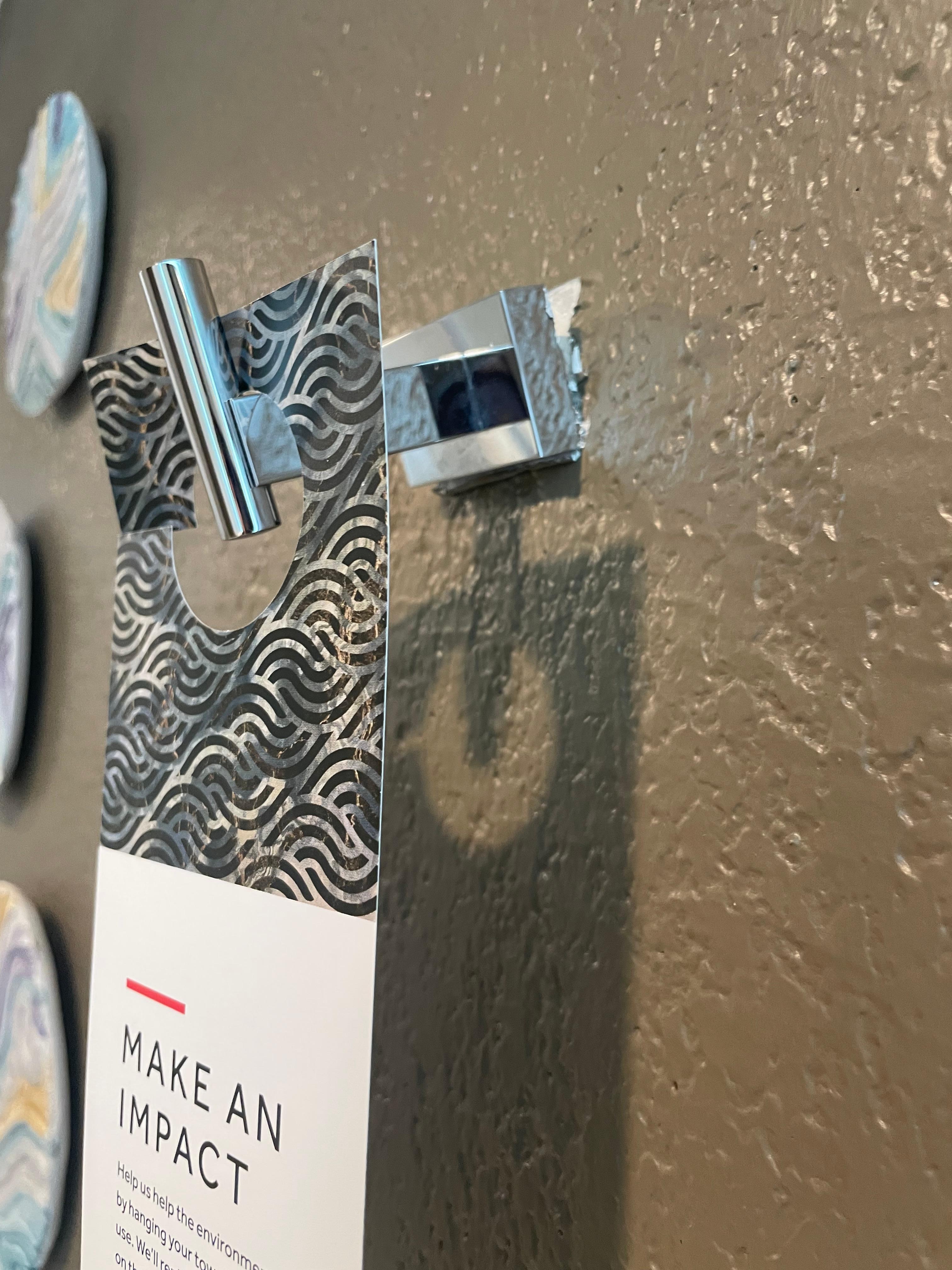 Bathroom hook dangling - easy fix Marriott! 