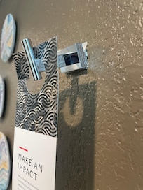 Bathroom hook dangling - easy fix Marriott!