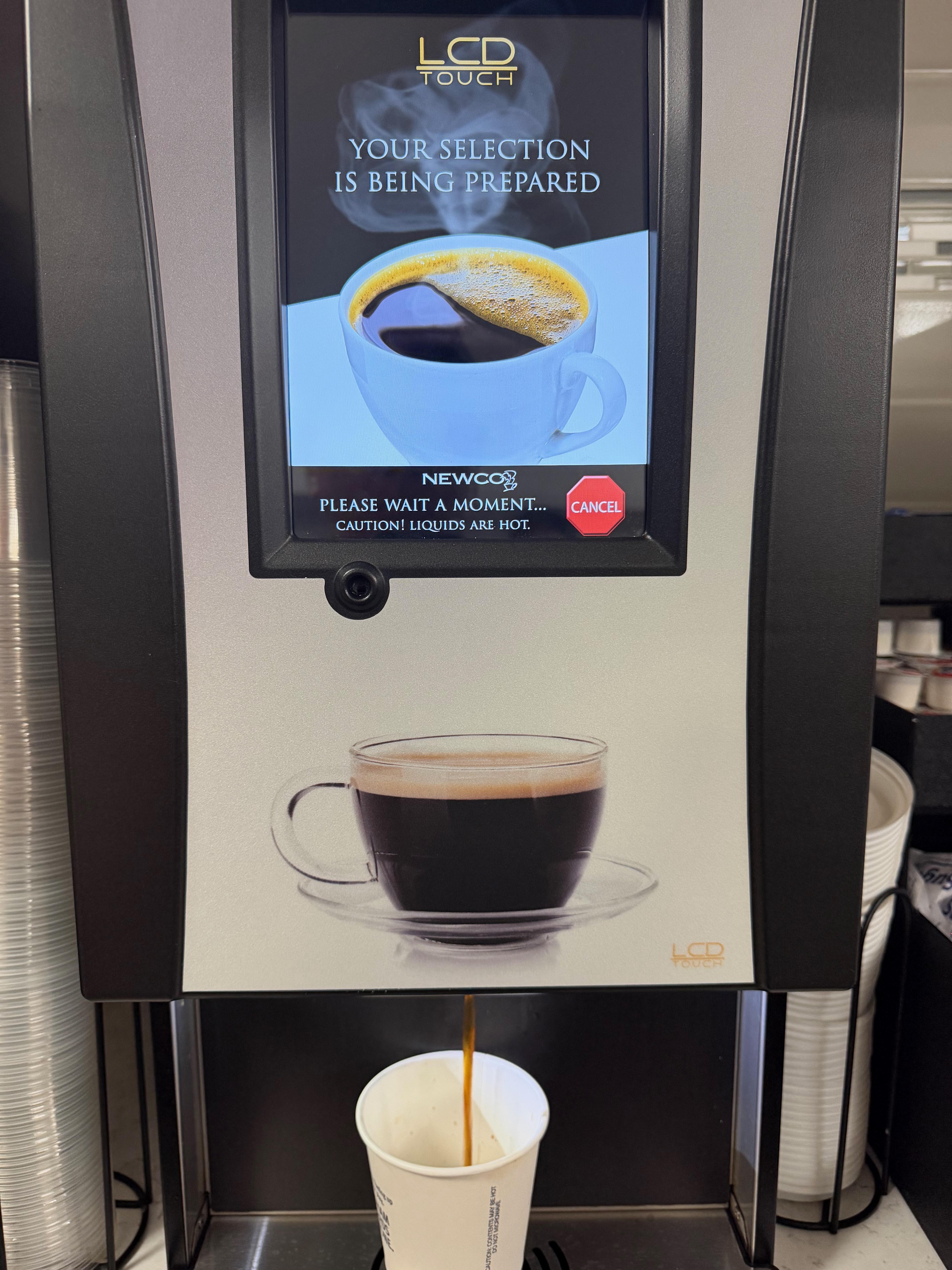 Got my decaf espresso. No, it's not some cafe but not bad for a machine.