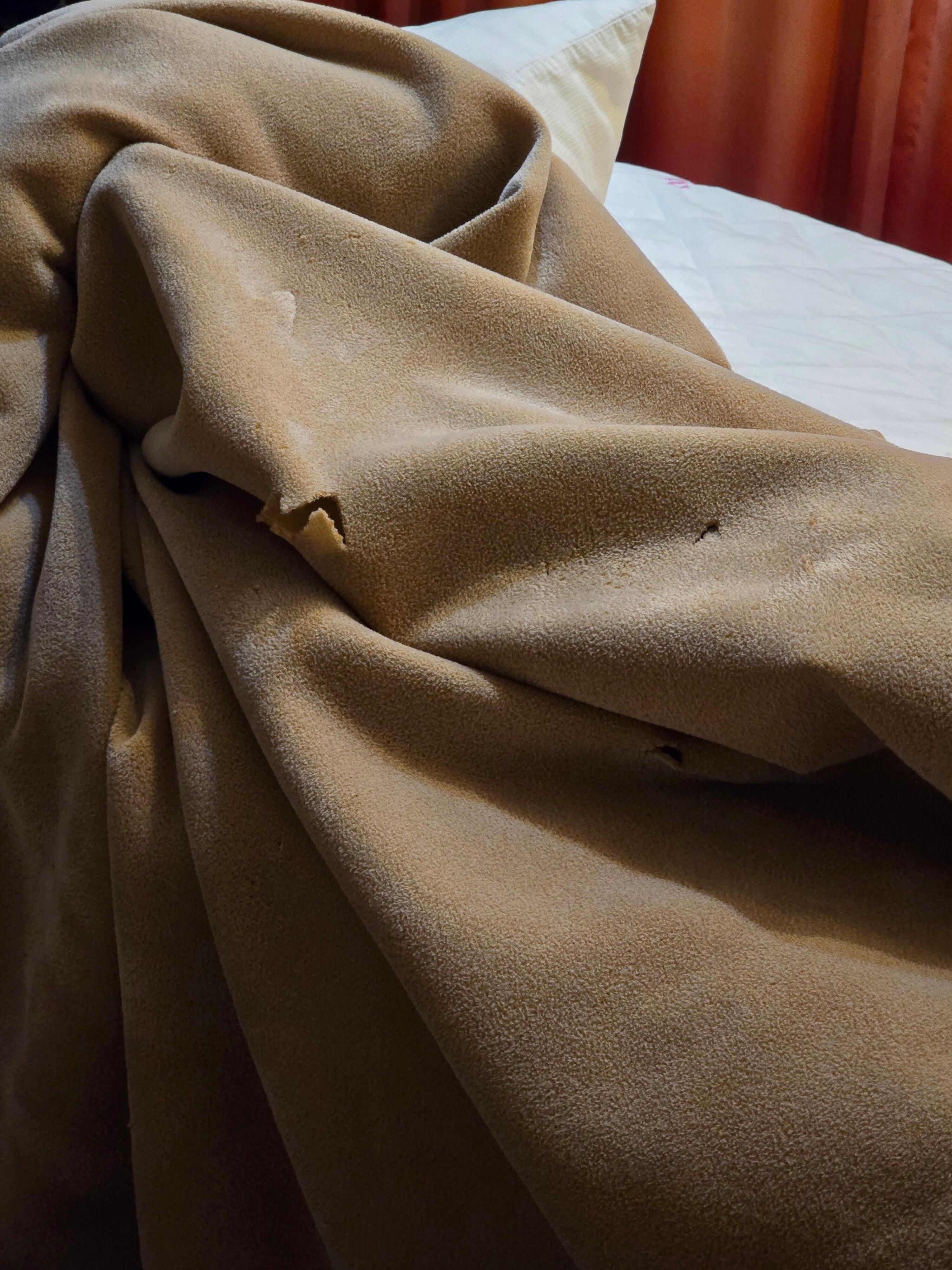 Blanket with holes
