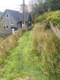 Through the sheep pasture to the cabin