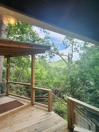 The views of the mountains from the bedroom deck