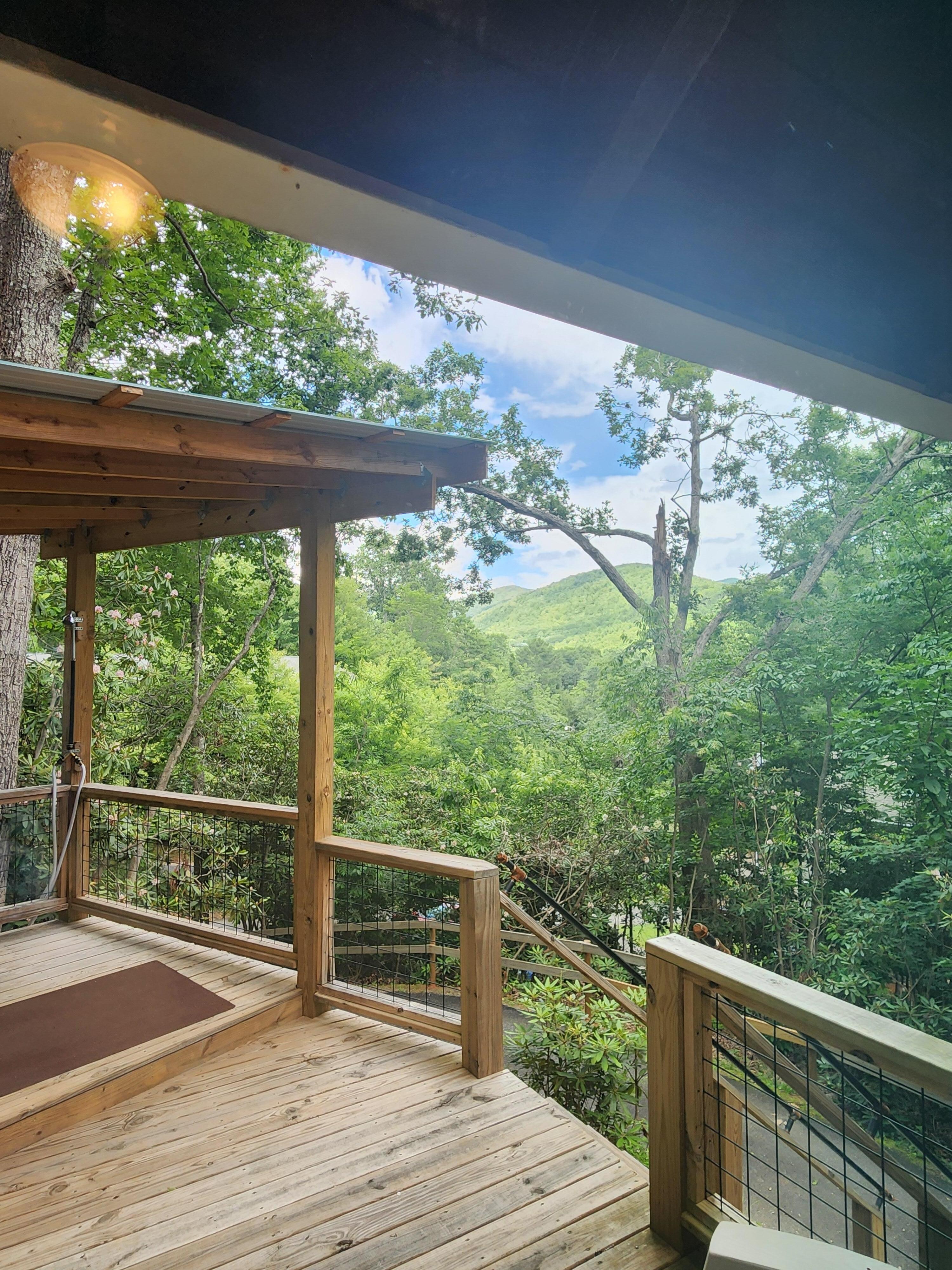 The views of the mountains from the bedroom deck