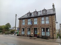 Front of hotel, even in the rain was welcoming.