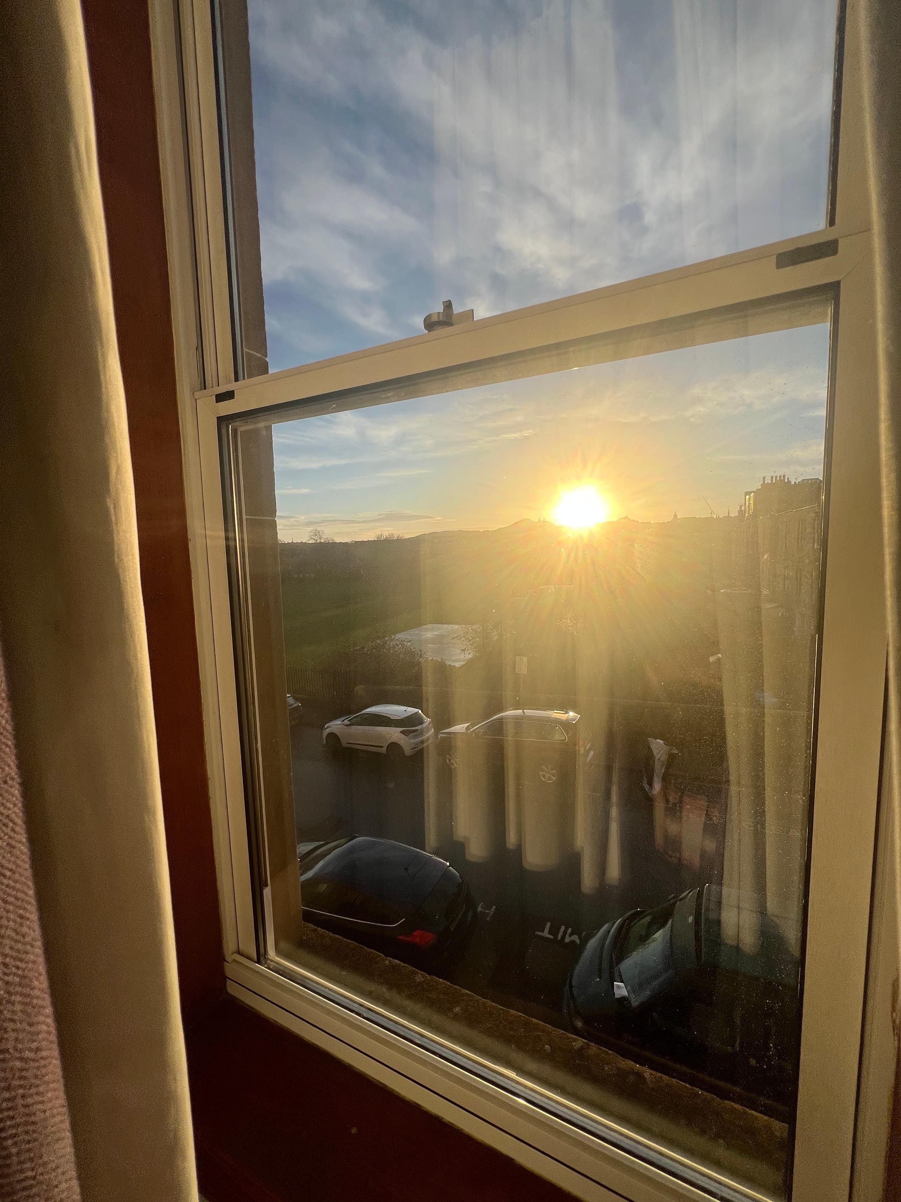 Views out the kitchen and the living room. Sun rise and sun set. 