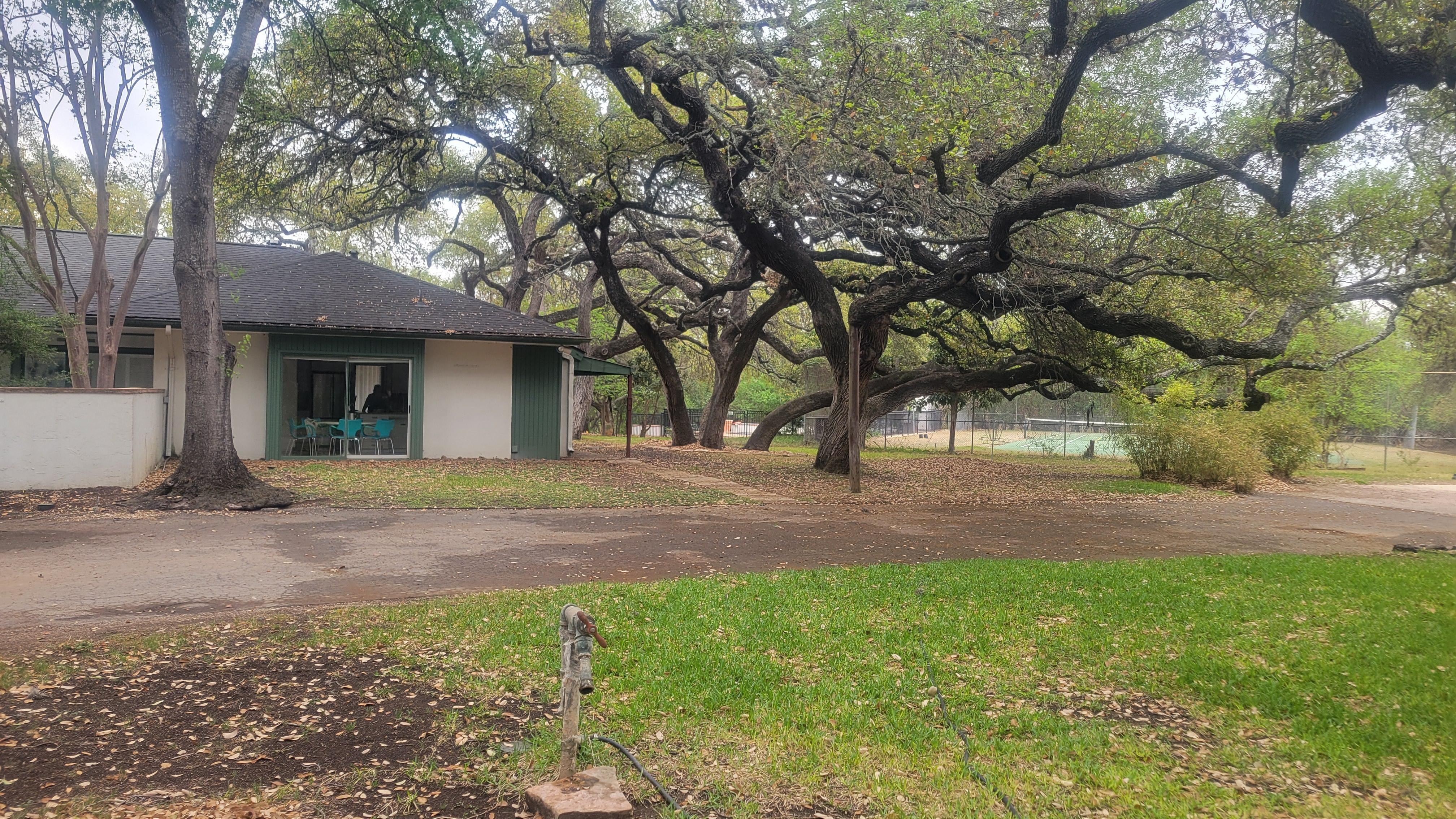 Right side of house and pool/courts