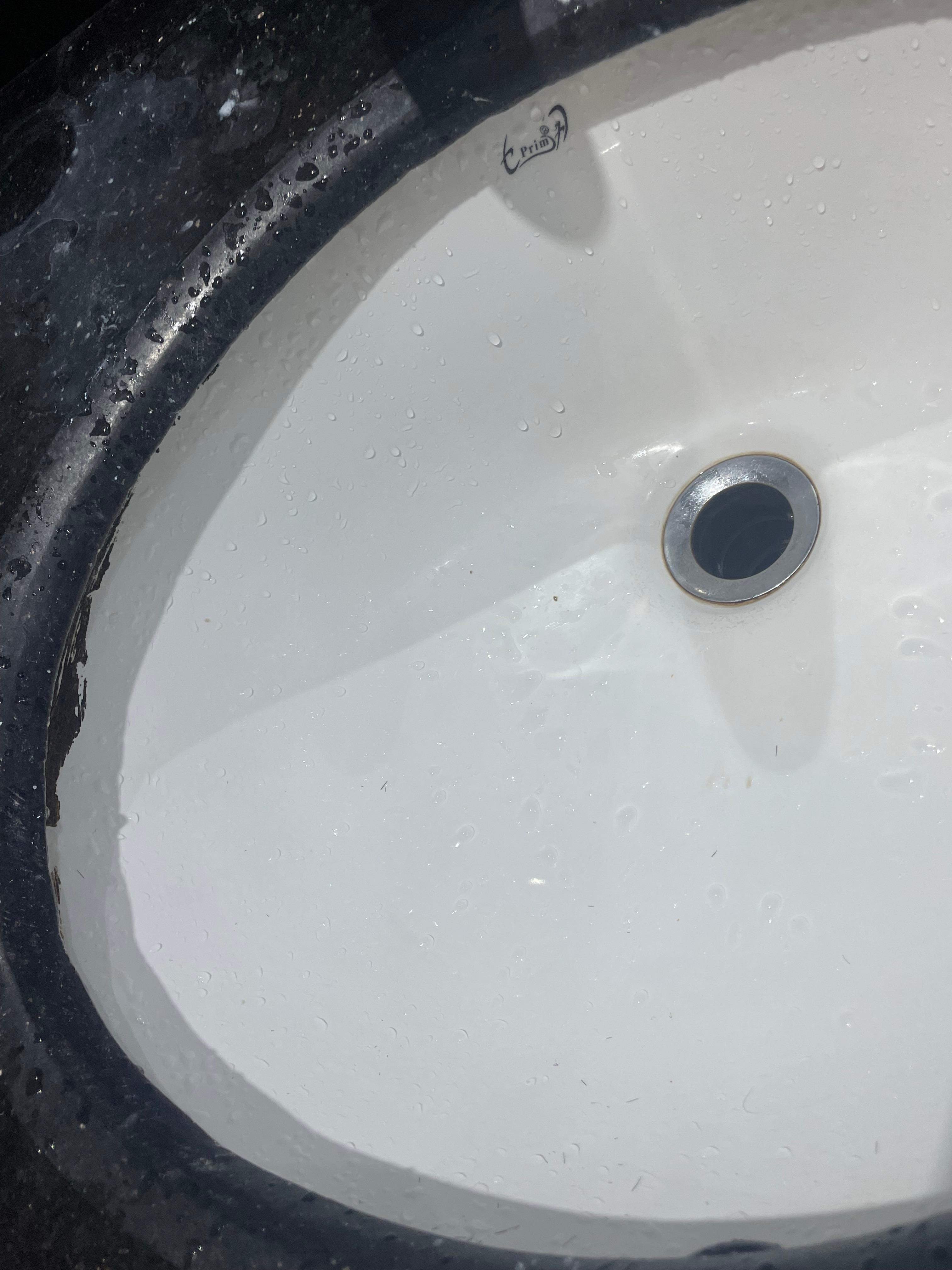 black stuff around sink and even some parts of shower