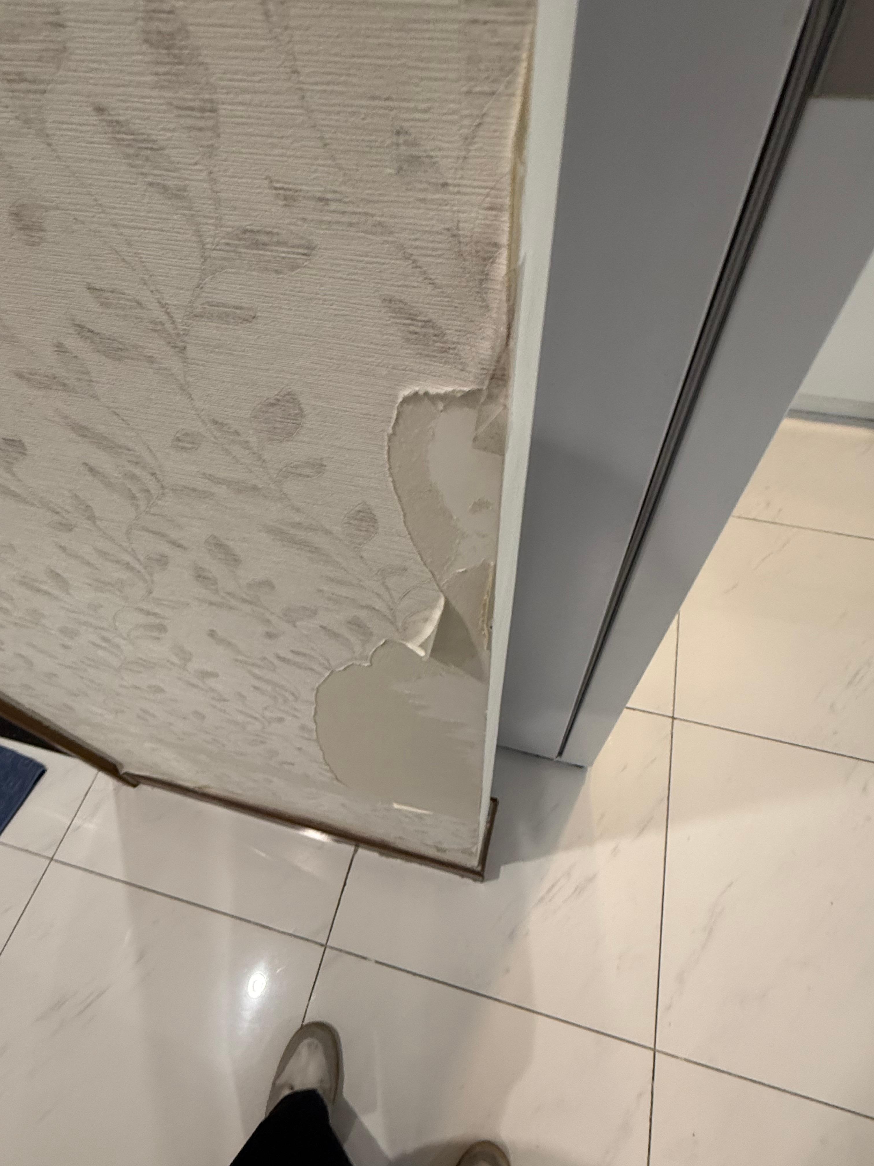 Wallpaper falling from the wall