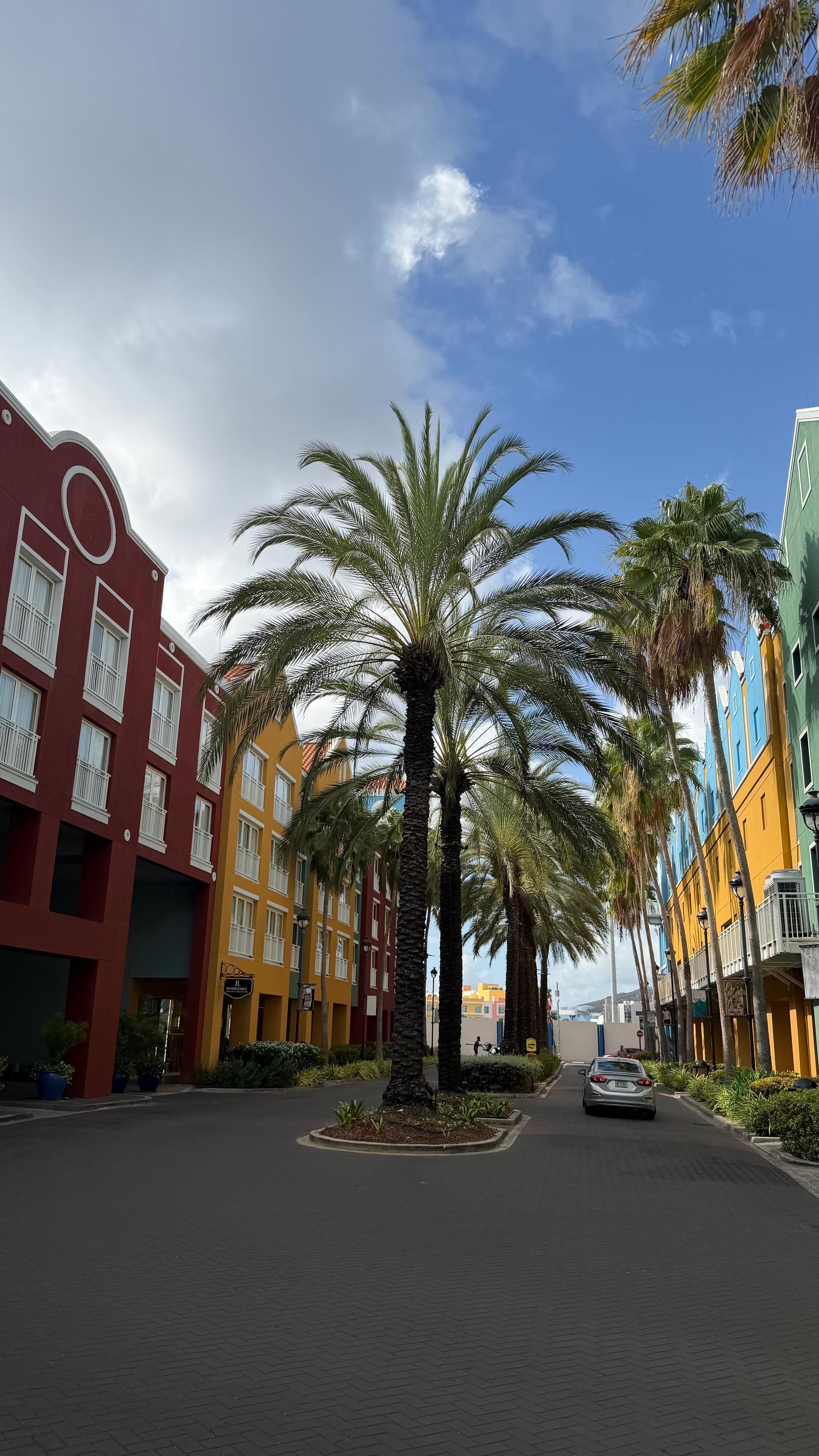 Between the garage and hotel