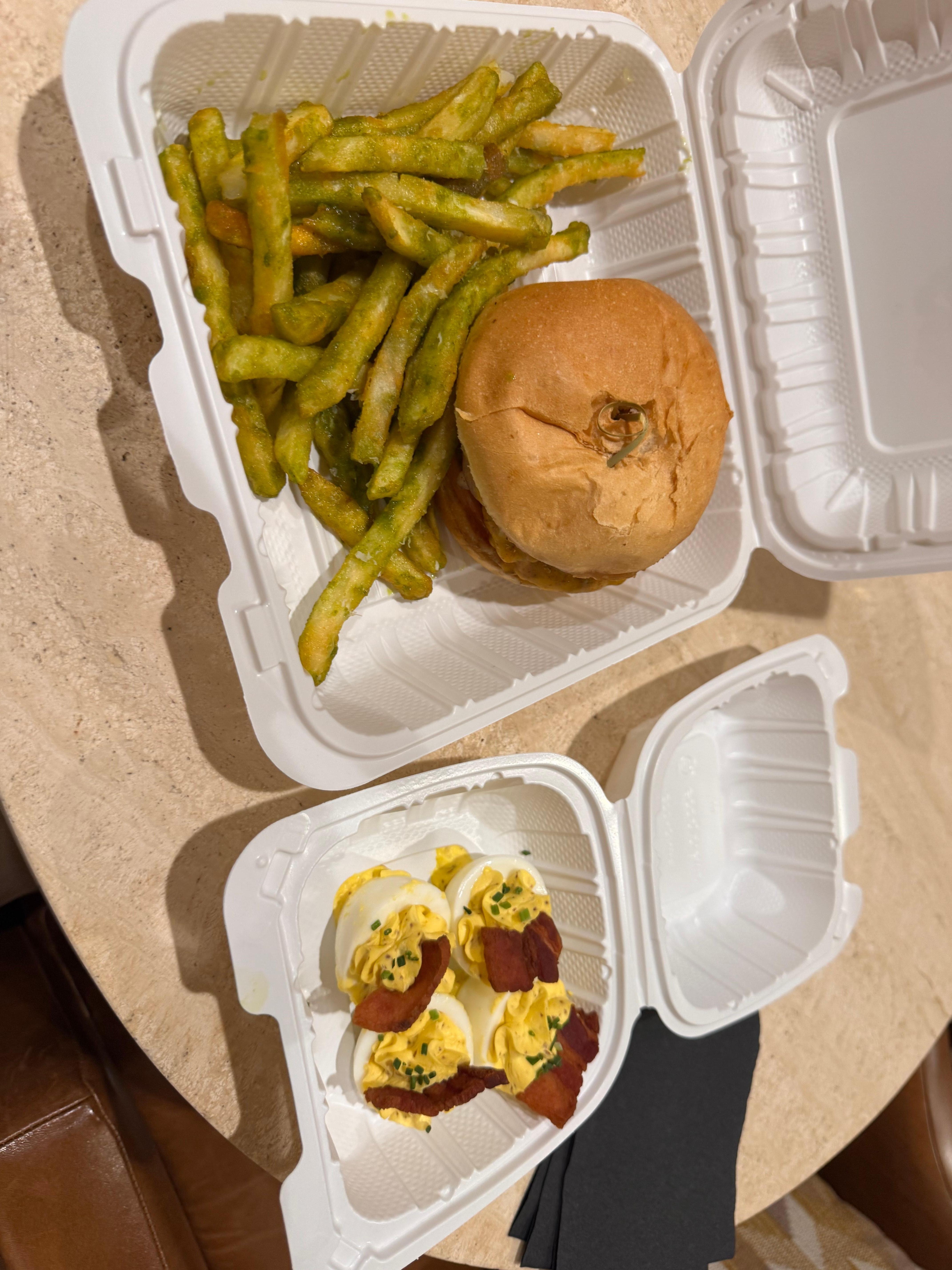 Burger, pesto fries, and deviled eggs
