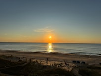 View from balcony during sunrise.