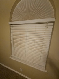 Dirty blinds haven’t been cleaned in years.