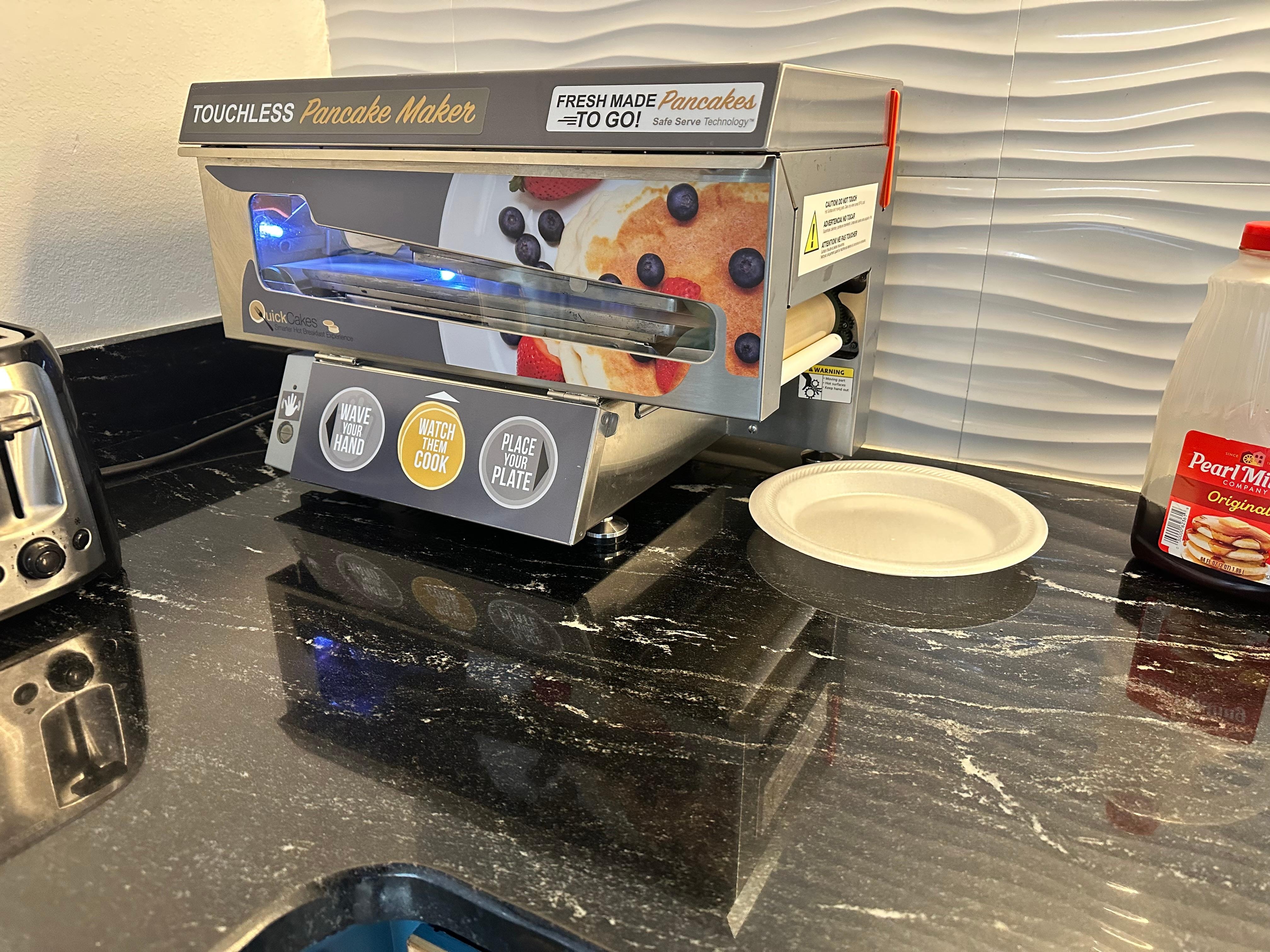 Touchless pancake maker, makes 2 at a time. 