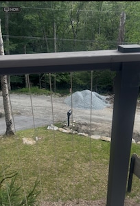 Gravel pile in front of driveway