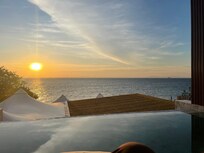 Sunrise from the room’s private terrace/pool area