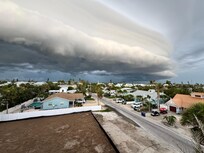 Picture of a storm from the rooftop patio.