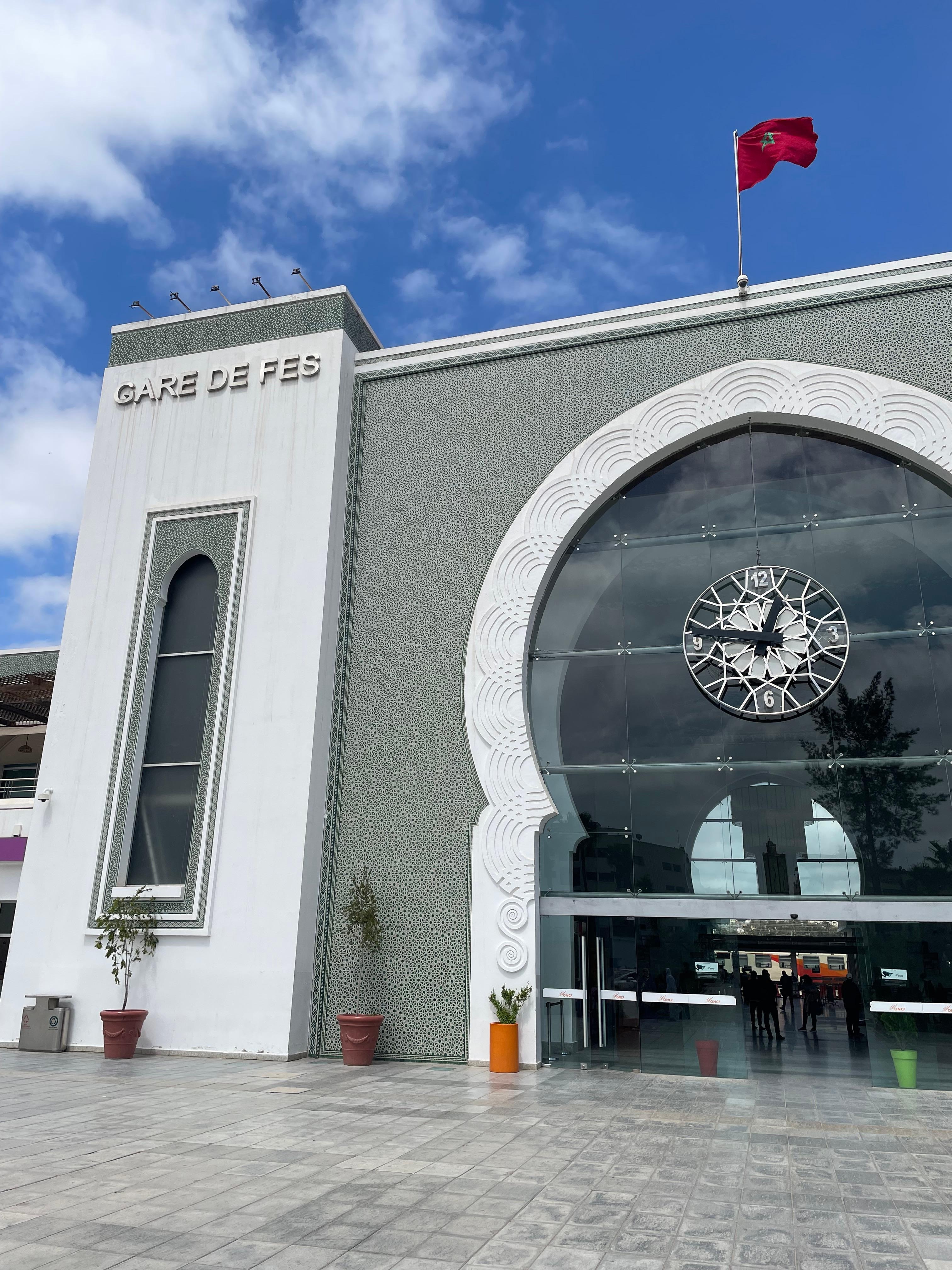 Fes train station less than 10 minutes walk. Only 10 Dirhams by small taxi.