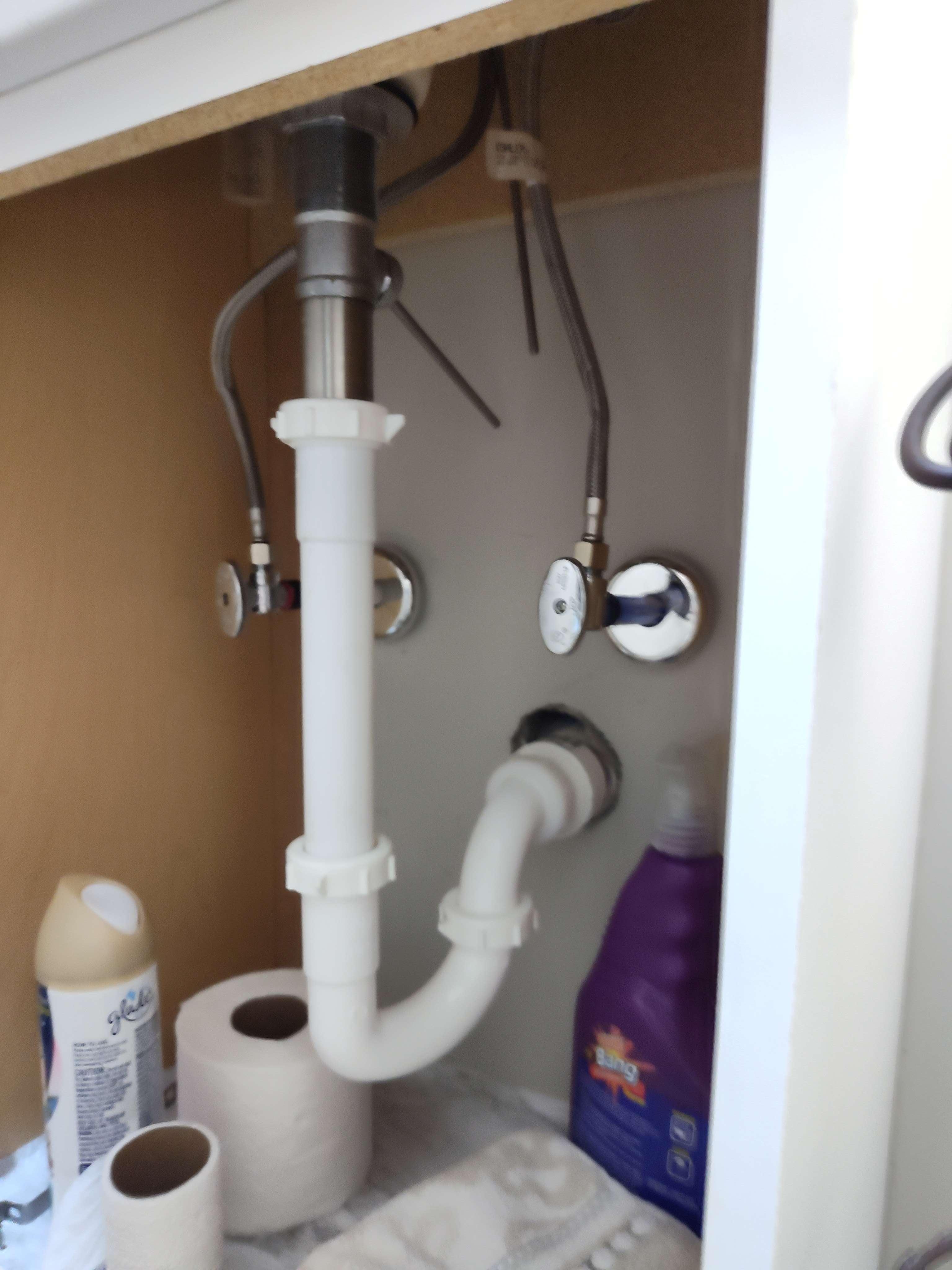 Cannot use 1/2 bath sink.  Drain plunger is installed closed.  Sink top actuator is not connected.