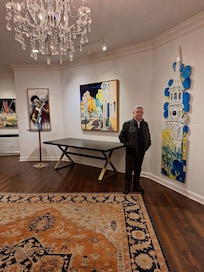 The reception is an art gallery of good taste and refinement.