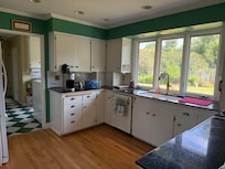 Kitchen looking toward laundry room