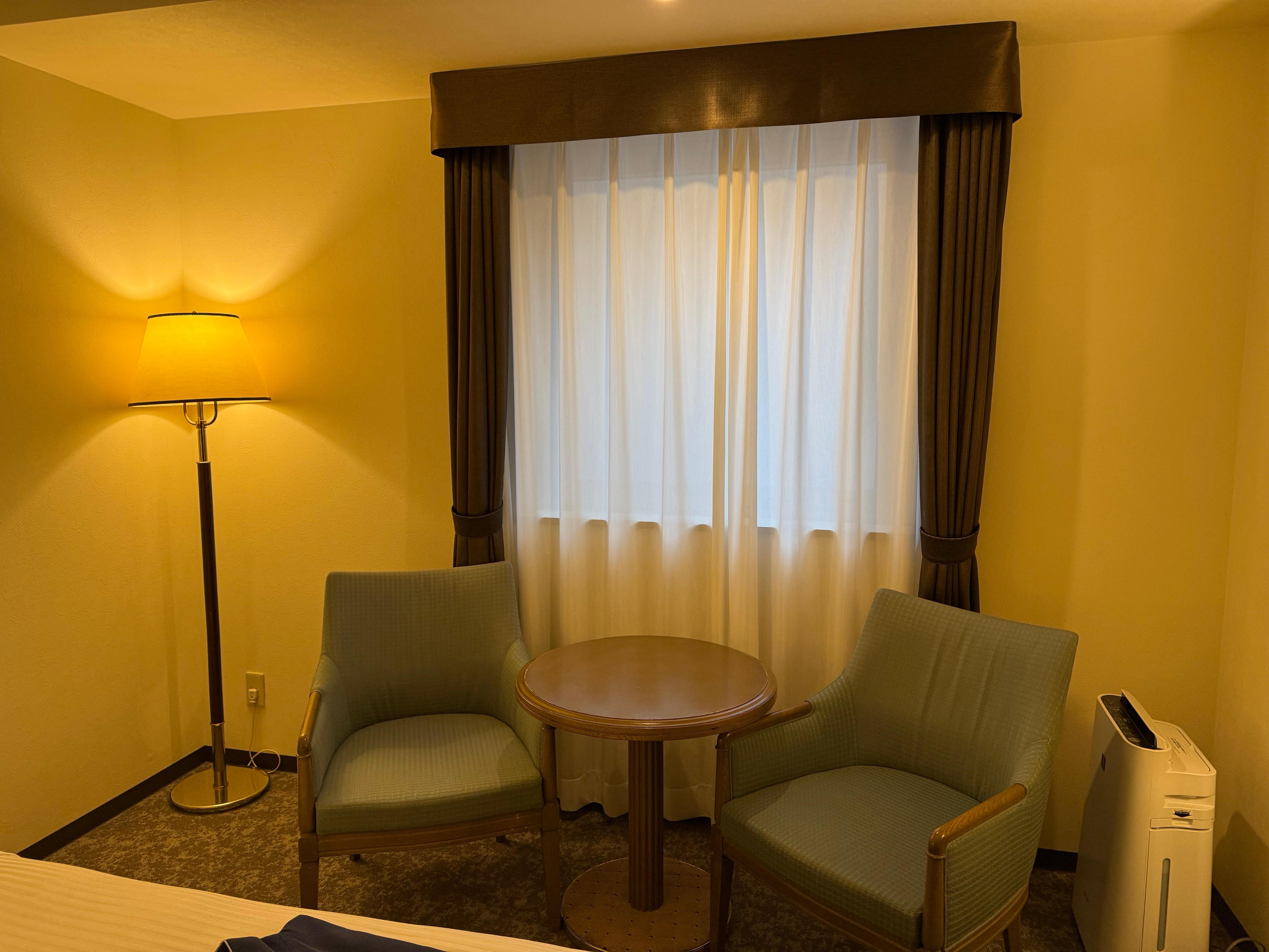 Table and chairs!  They even have one suit case stand!